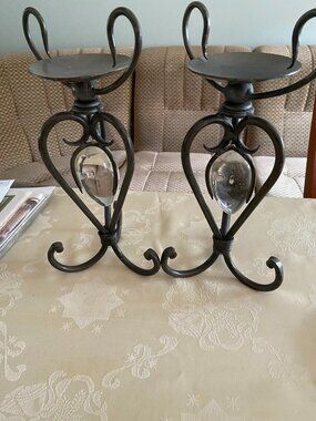 2 Black Wrought Iron candle holders with a glass inserts